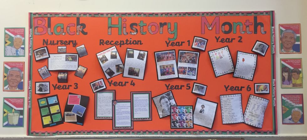  A display board showing examples of work from eachc year group relating to Black History Month