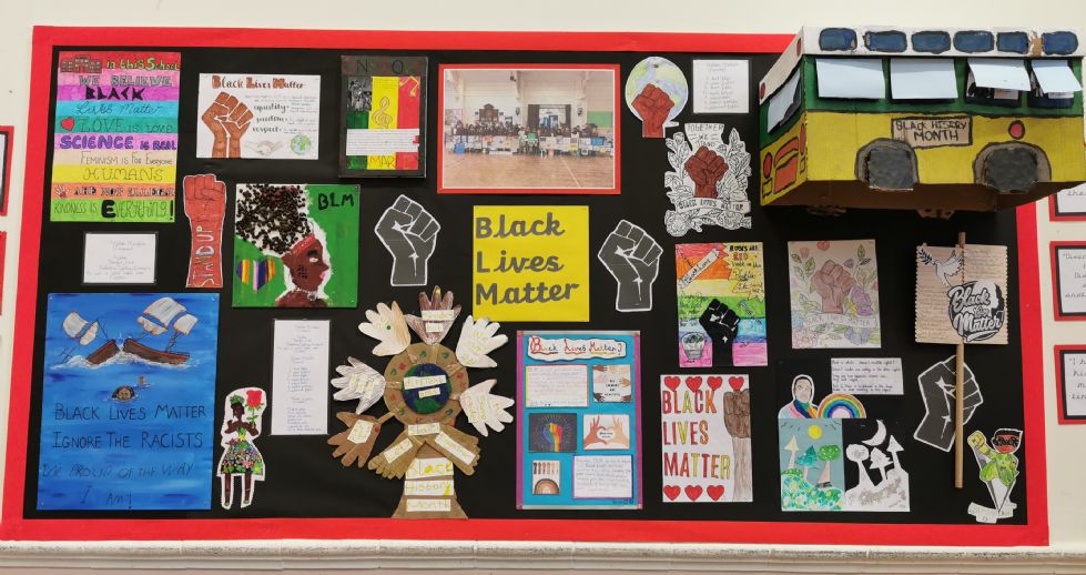Display board showing children's work related to Black History Month