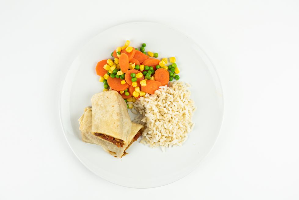 a wrap with white rice and vegetables